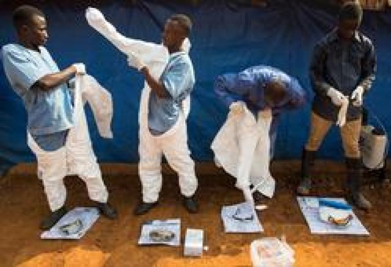 Re-integration of Ebola Volunteer Burial Teams into their Communities Re-integration of Ebola Volunteer Burial Teams into their Communities